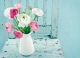 Postkarte - White and Pink Flowers on light blue chair